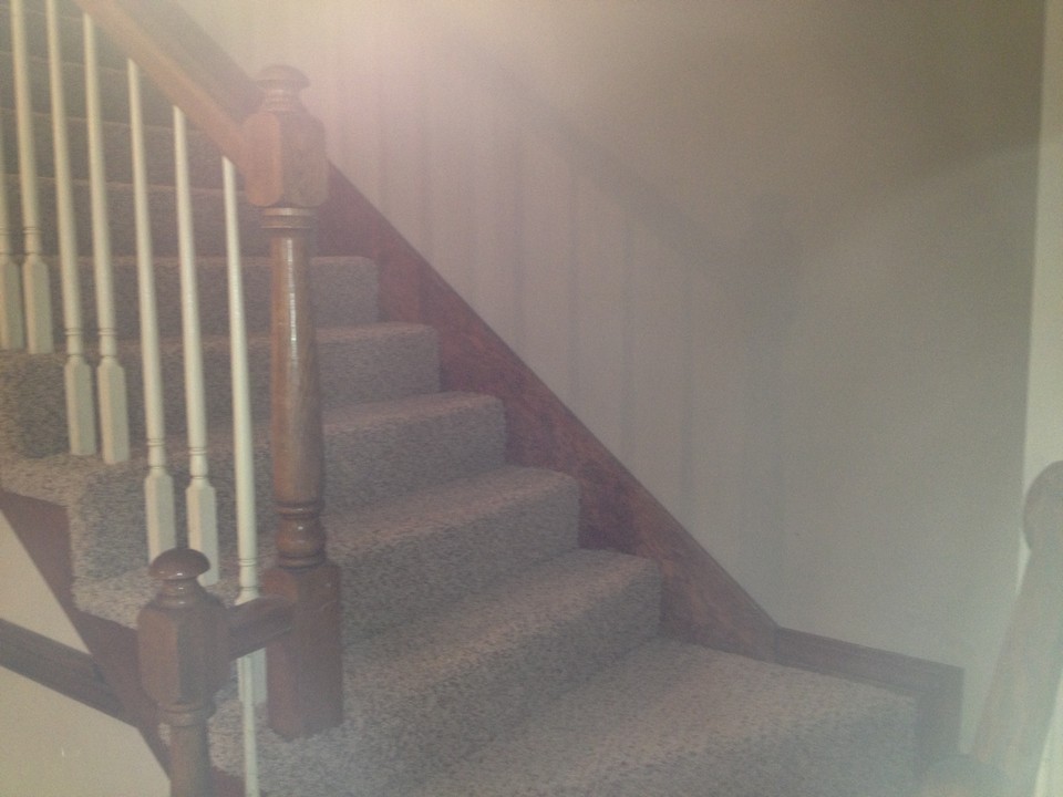 stairs to 2 bedrooms and bath, attic fully floored at entry off den